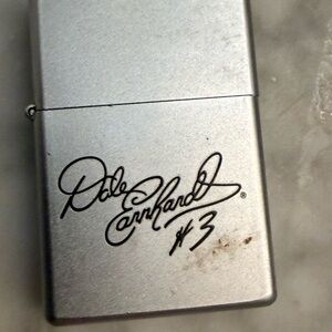 Silver Zippo Lighter with Signature Design